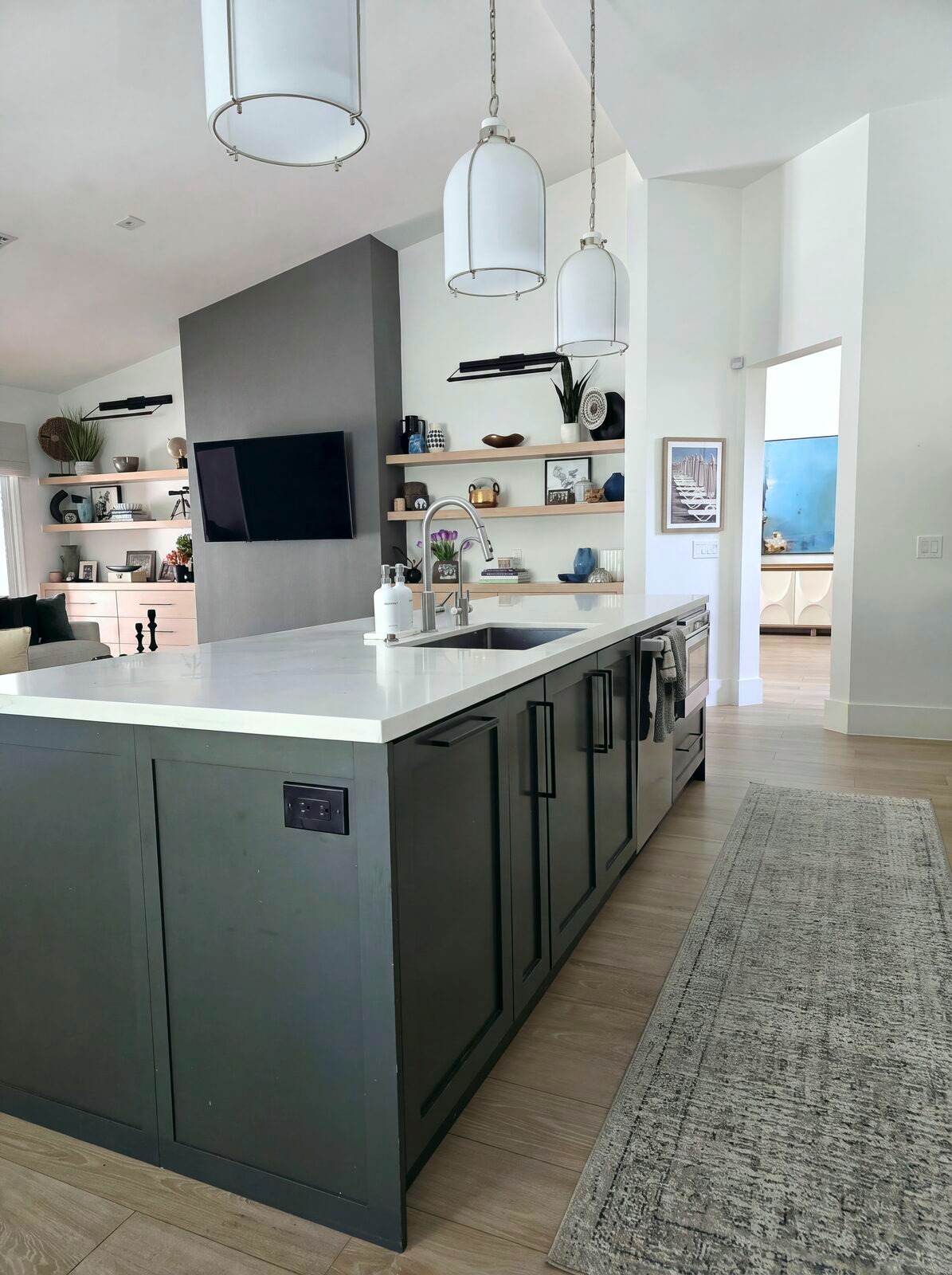 Chef's kitchen with contrasting island and quartz counters