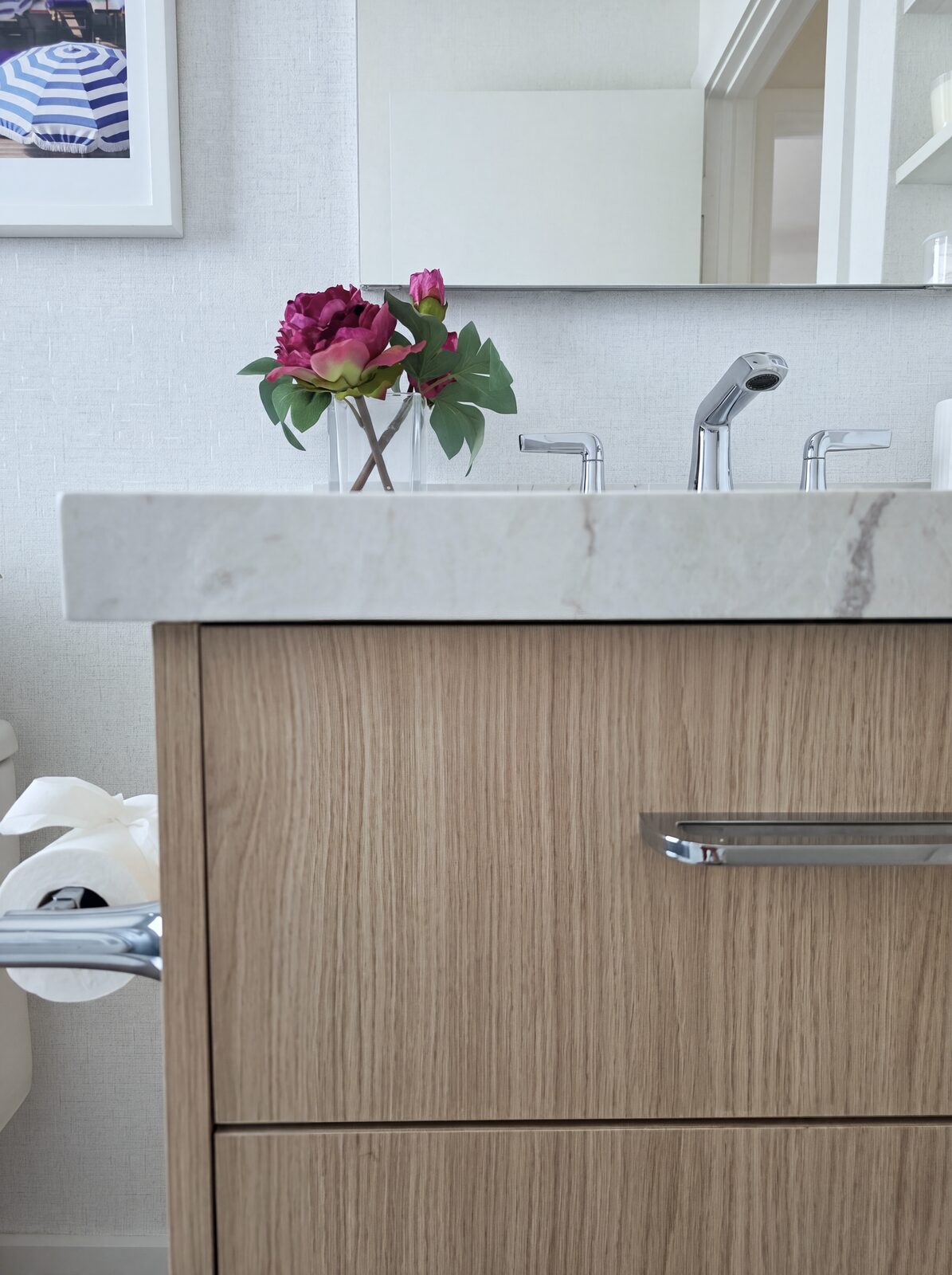 Vanity detail with marble counter and peony