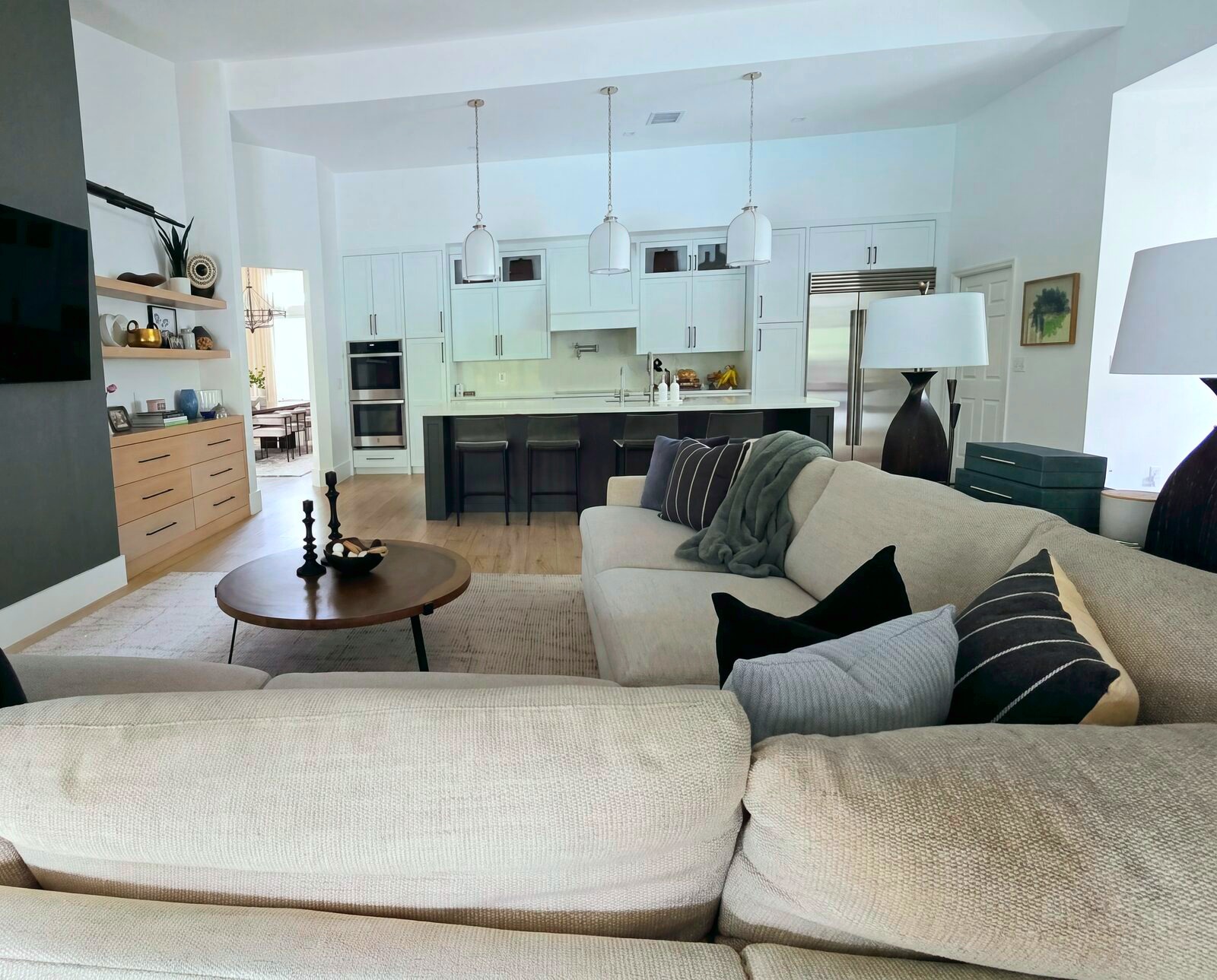 Open-concept living and kitchen with oversized sectional